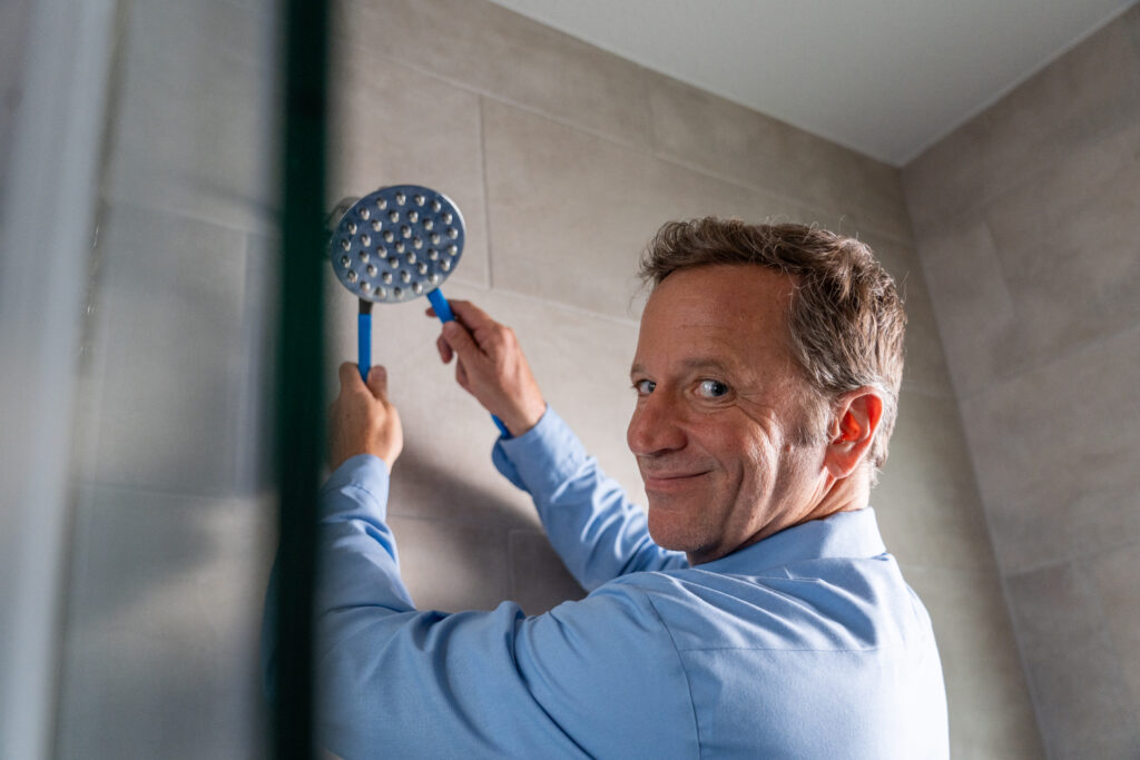 Local Plumber Installing a Shower Head