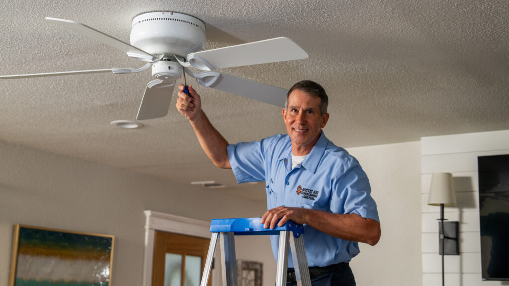 Arctic Air Electrician Installing Ceiling Fan